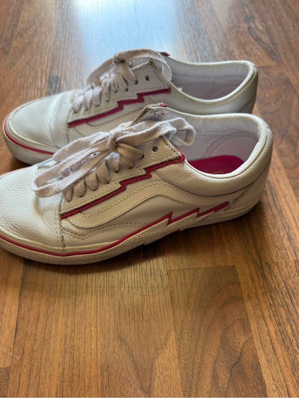 Vans White Leather Sneakers with Pink Lightning Accent